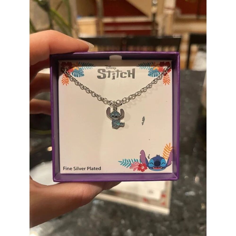 Disney Womenโs Stitch necklace. Licensed silver Flash-Plated Fashion Jewelry